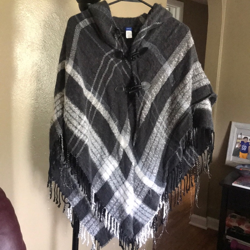 One size fits all fringe button cape